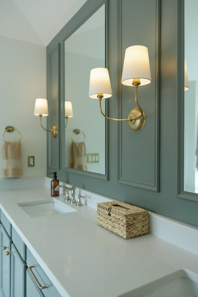 Refined bathroom design in Sandy Springs, Georgia featuring a walk-in shower, marble tile, and luxurious finishes by Megan Paterson Interiors.