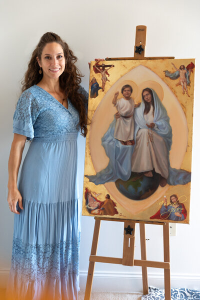 woman smiling at artwork