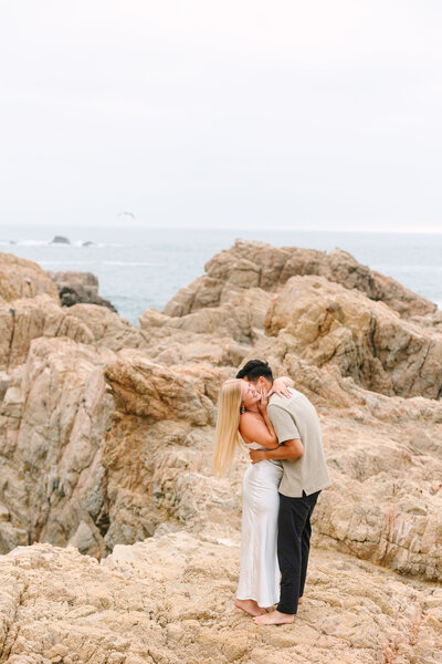 Couple giggling with beauitful scenery