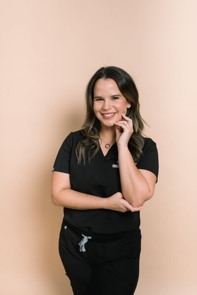 esthetician posing for studio branding session at studio house az