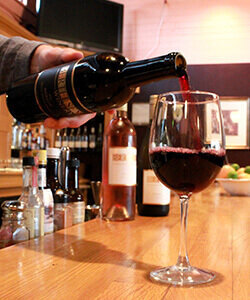Wine Down Wednesday Special at  Stanwood Grill American Restaurant