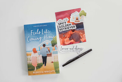 Image showing Feels Like Coming Home book, stickers, and art prints included in book purchase