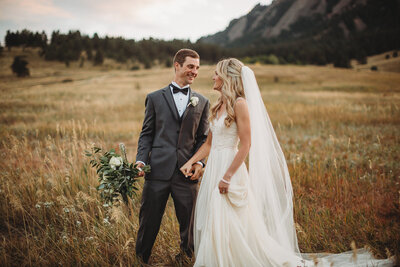 cowboy kisses bride on forehead