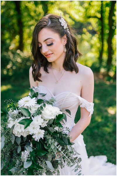 Sacramento Wedding Photographer captures bride holding bridal bouquet after national park elopement