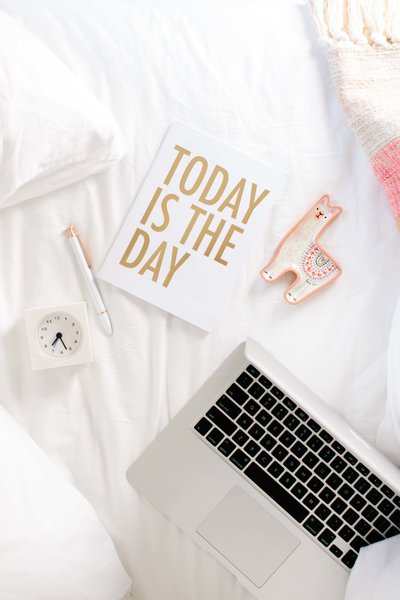 An image of a flatlay with a sign that says "Today Is The Day" for Systems and Workflow educator Dolly DeLong Education