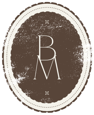 Brown and cream distressed sublogo with scalloped edges and dotted lines in an oval shape with BM in the middle and the submark above and below.