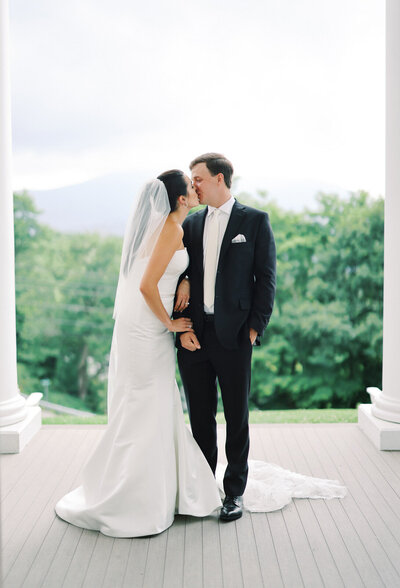 A North Carolina film wedding photographer captures an elegant Blowing Rock summer wedding.