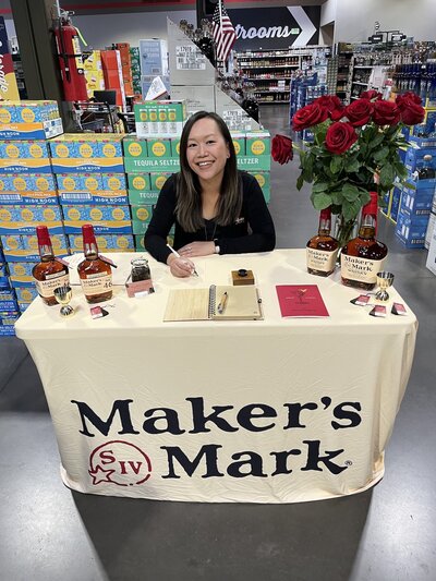 Brand activation for Maker's Mark at a liquor store, personalizing bottle labels
