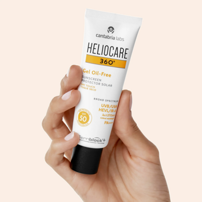 Hand holding skincare cream product from a beauty brand represented by SA Communications, UK health and beauty PR agency.