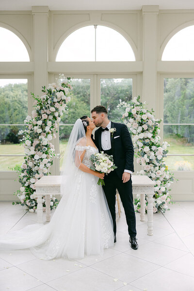 Bride and groom walk up memorial steps at their DC wedding