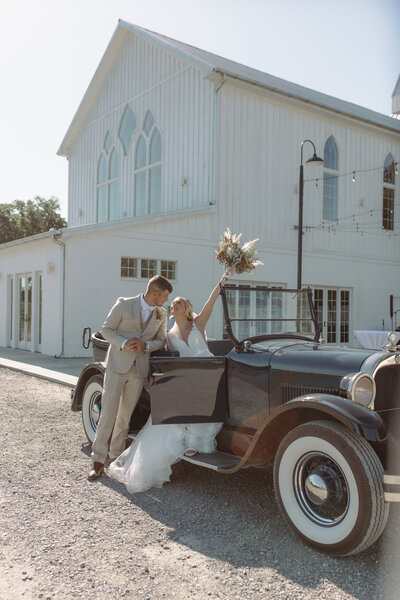 bride and groom portraits in columbia, Tennessee embracing one another in an outdoor scenery