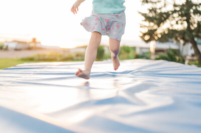 little girl runs during family photos