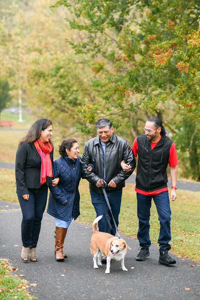 Family walking with dog