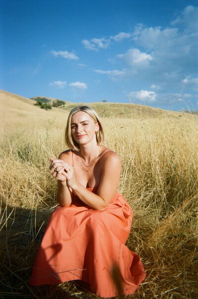 Jaiden sitting in chair and laughing