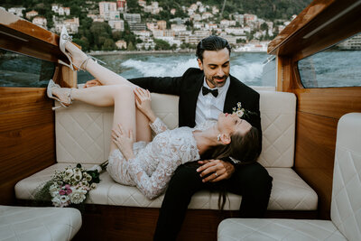Couple on a boat in Lake Como for their multi day wedding
