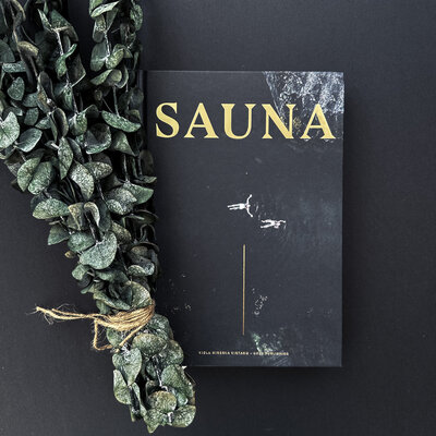 sauna book with eucalyptus bough