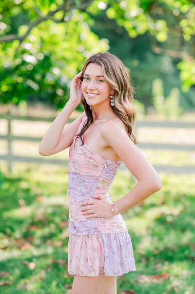 girl smiling in a pink dress
