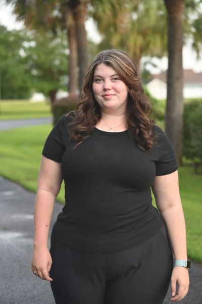 Lilly Mcldendon, Office/Chiropractic Assistant posing for a mug shot