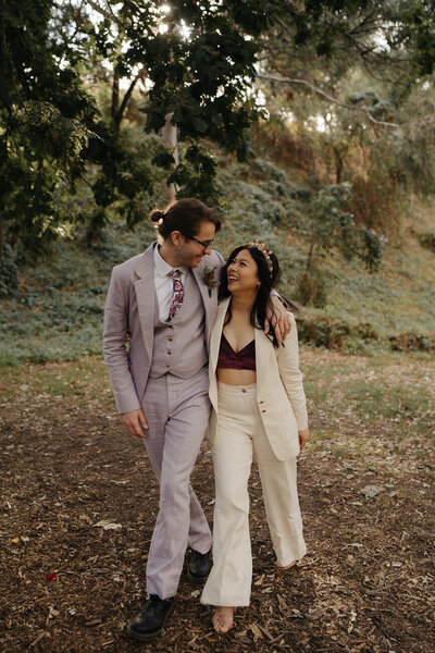 couple walking under the collingwood childrens farm oak tree
