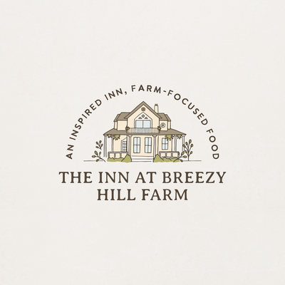 Charming logo for The Inn at Breezy Hill Farm, featuring an illustrated farmhouse, elegant serif typography, and a rustic, farm-inspired aesthetic