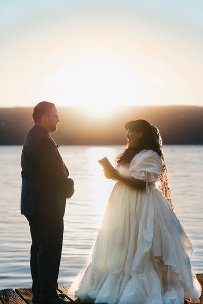 AJ leans in for a kiss from his bride to be .