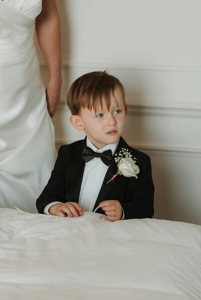 Little boy in tux in The Langham Hotel London 