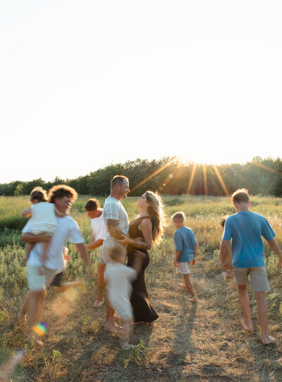 family running in a field