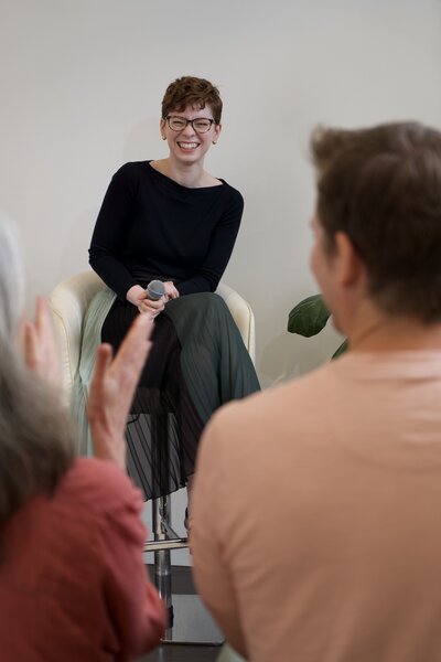 Ashley Laabs giving a keynote on personal branding and thought leadership for business leaders