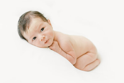 Awake baby during newborn session with Stephanie Nunley.