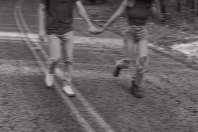 blurry image of couple running