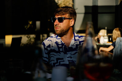 Paul from Paul Joseph Photography enjoying the sunshine wearing blue cubitts sunglasses