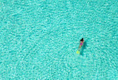 snorkeling in turquoise waters