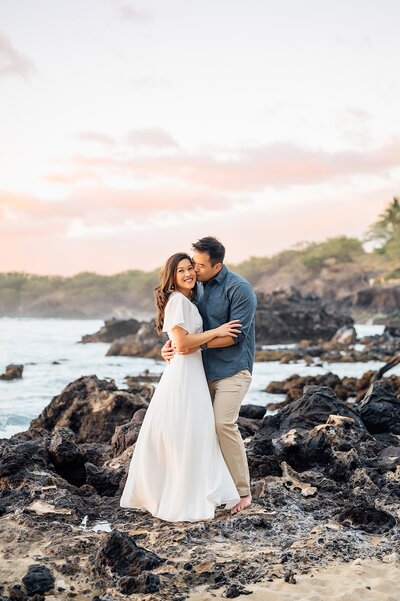 couple snuggling during a big island elopement