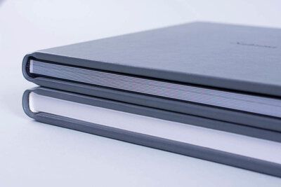 Two wedding albums  that's provided by Indianapolis wedding photographer GreenPoint Photographer.
