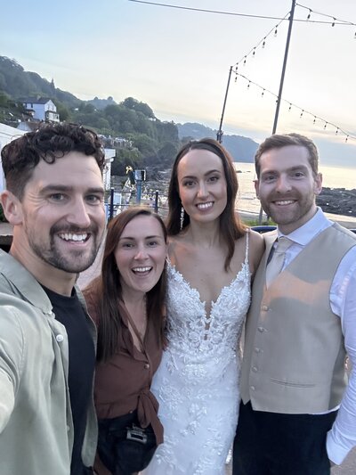 Amy & Nick posing with couple