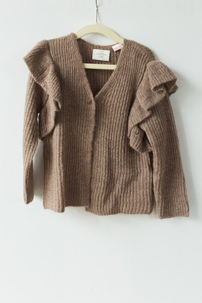 brown knit cardigan with flutter shoulder detail