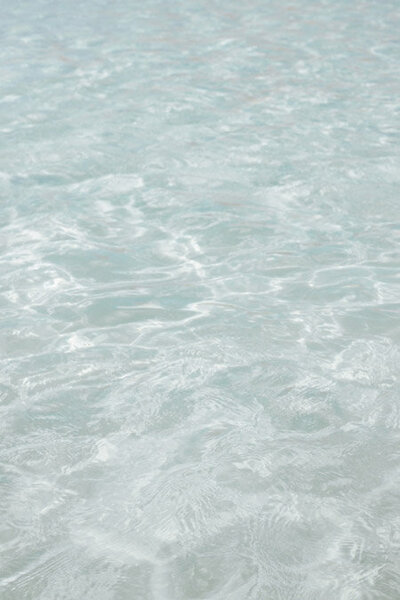 close up photo of water surface. Light blue