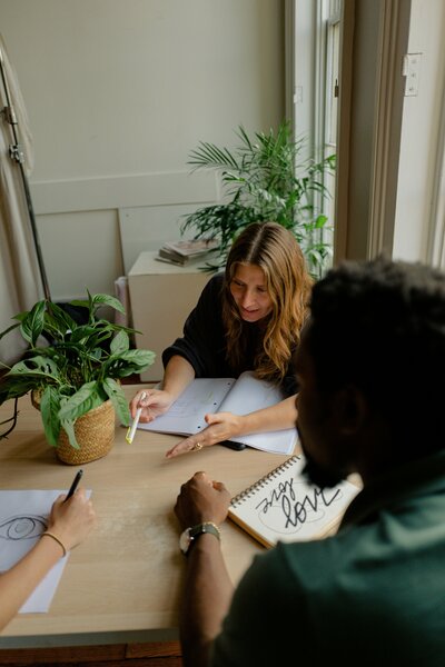 women working together at a table 