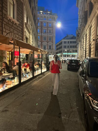 Woman walking in the street in the city