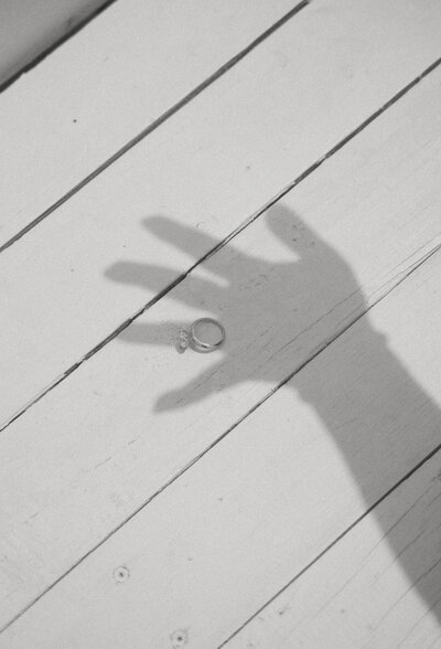 artistic detail of engagement ring and shadow, captured by a Pennsylvania wedding photographer
