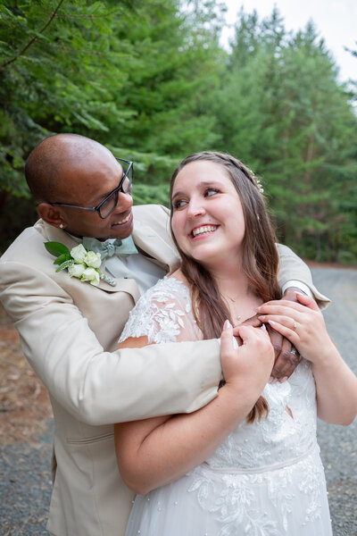 Idaho Falls Photographers capture Labelle Lake wedding with couple hugging