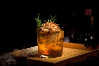Our signature whiskey cocktail, the Mesquite Old Fashioned, perfectly balances smoky notes with a hint of citrus for a bold and refreshing drink.