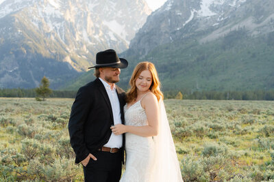 couple and their wedding party during golden hour
