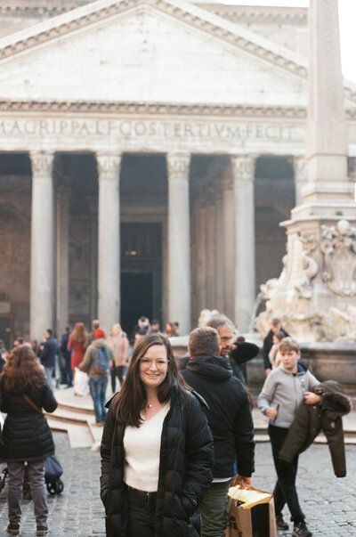 girl stands in front of pantheon