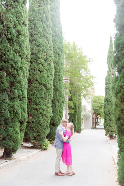 couple kissing downtown Charleston photographed by Kaitlin Mendoza Photography, an Indianapolis engagement photographer