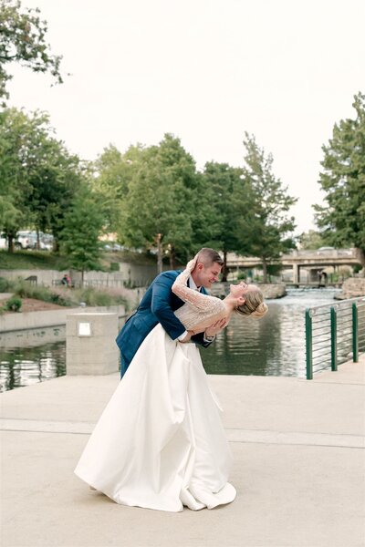 Bride and groom dancing by Austin Wedding Photographers