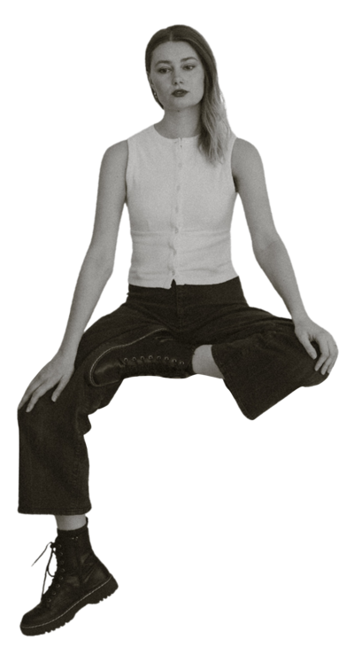Cutout of Lauren sitting with one leg swinging down into the website Intimate Wedding, Elopement, and Family Photography NYC and Western North Carolina Area