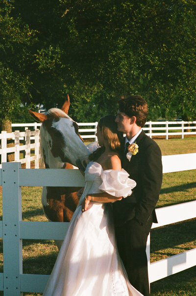 bride and groom holding hands