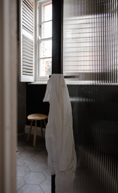 Editorial chair by window with natural light coming in photograph