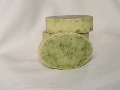 Handmade Lavender Honey Oatmeal soap with soothing properties stacked to show details